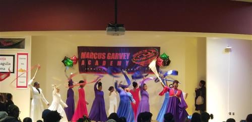 Girls dancing in liturgical dresses